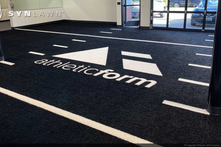 SYNLawn Baja Prefab turf logos for athletic weight room applications